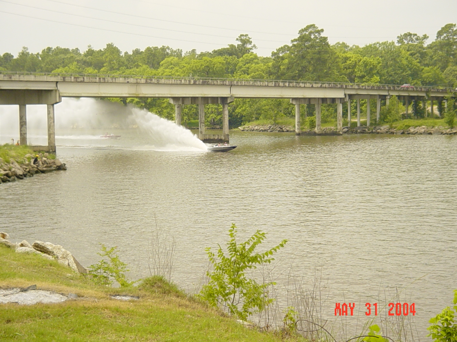 Bob_spraying_HWY_90_bridge.JPG